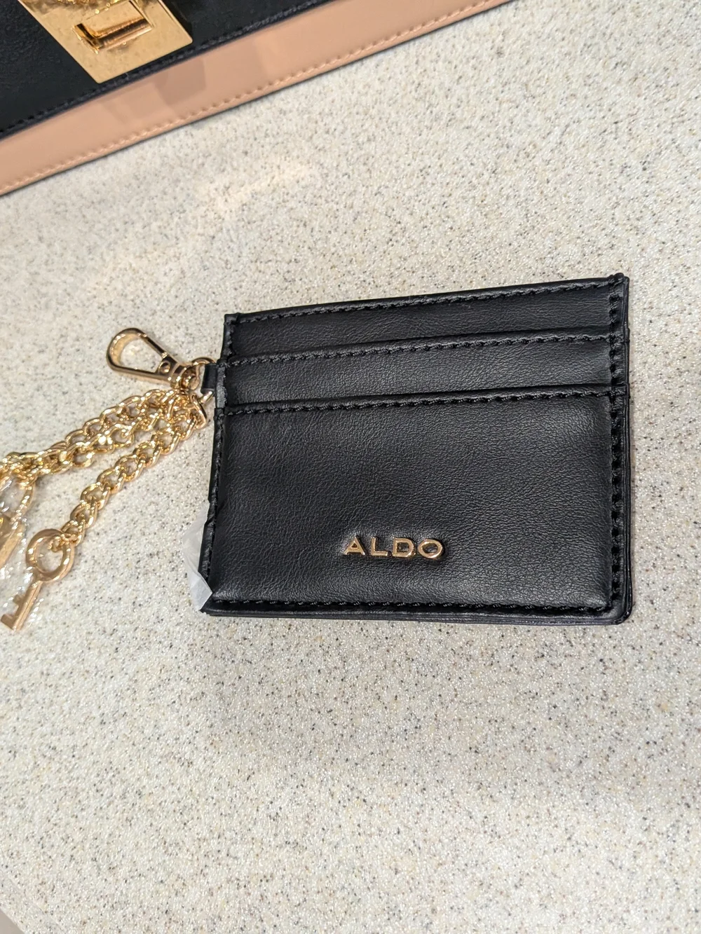 AldoTwo-Tone Black and Beige Top-Handle Satchel